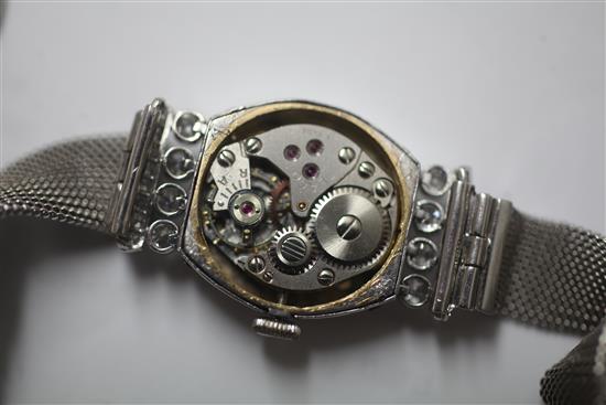 A ladys 1950s white gold and diamond set cocktail watch,